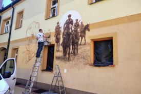 zarys portretu generała Zygmunta Podhorskiego oraz scena z kawalerią